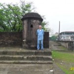 Me in front of a public urinal