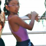 03 At her swim meet last month no Game Boy yet