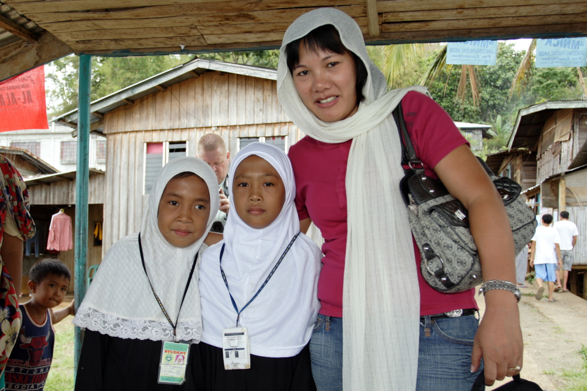 Posing with kids in Tugaya