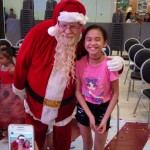 Another cute kid posing with Santa