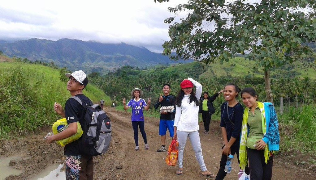 The teachers walking to the School our niece is wearing the white