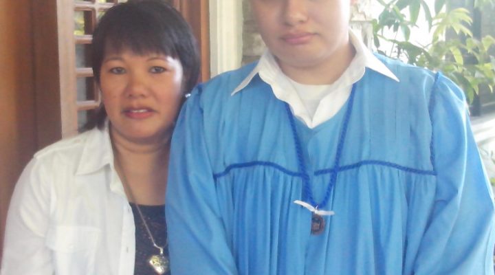 Feyma and Aaron a few years back when Aaron graduated from High School